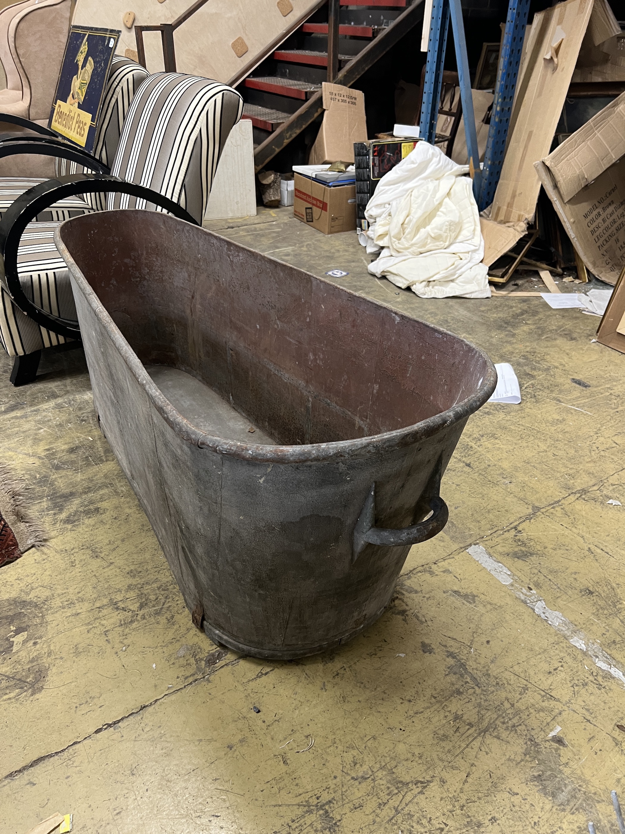 A vintage French galvanised bath, length 150cm, height 60cm